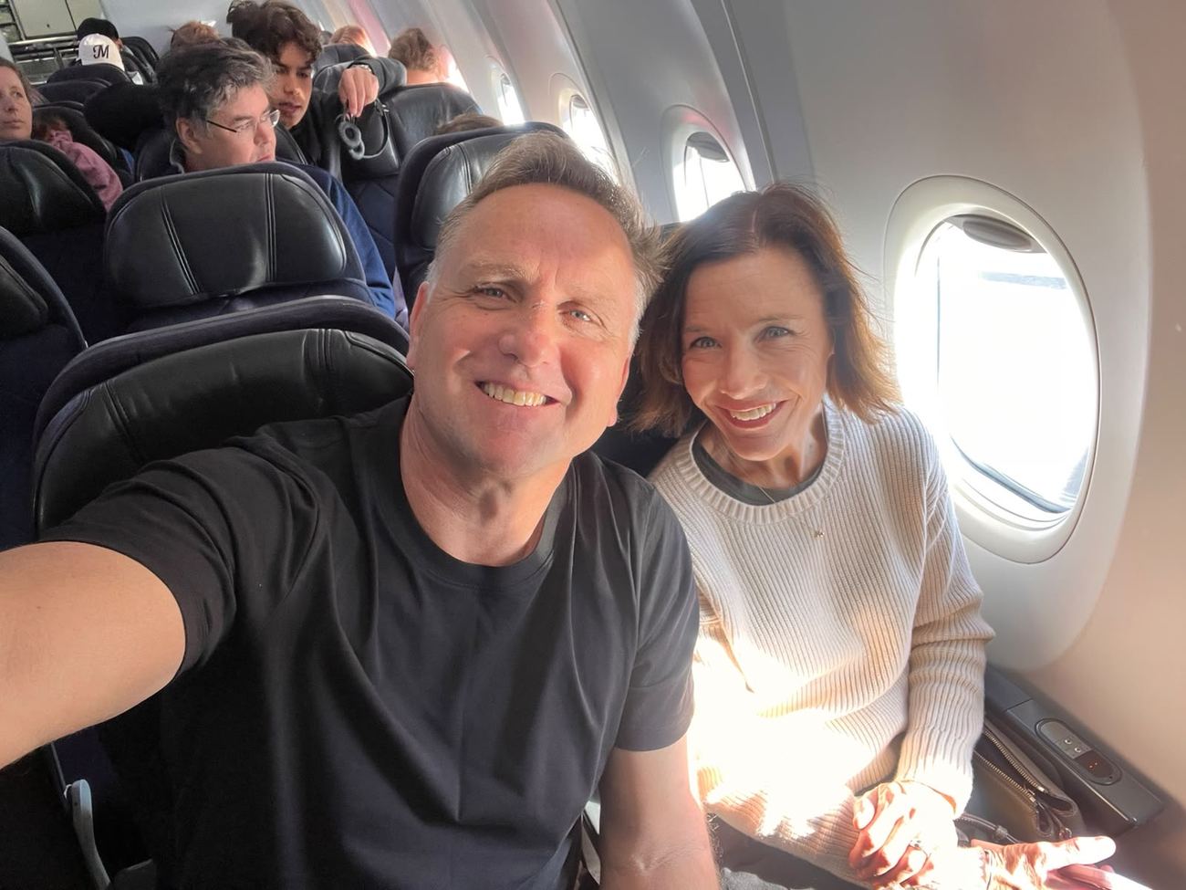 Couple selfie by the window seat