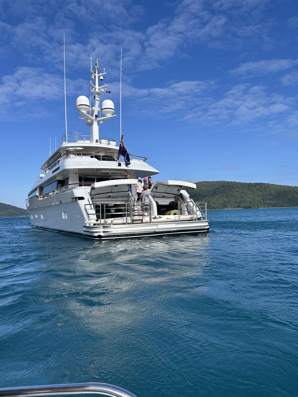 Masteka 2 at anchor, seen from the departing tender