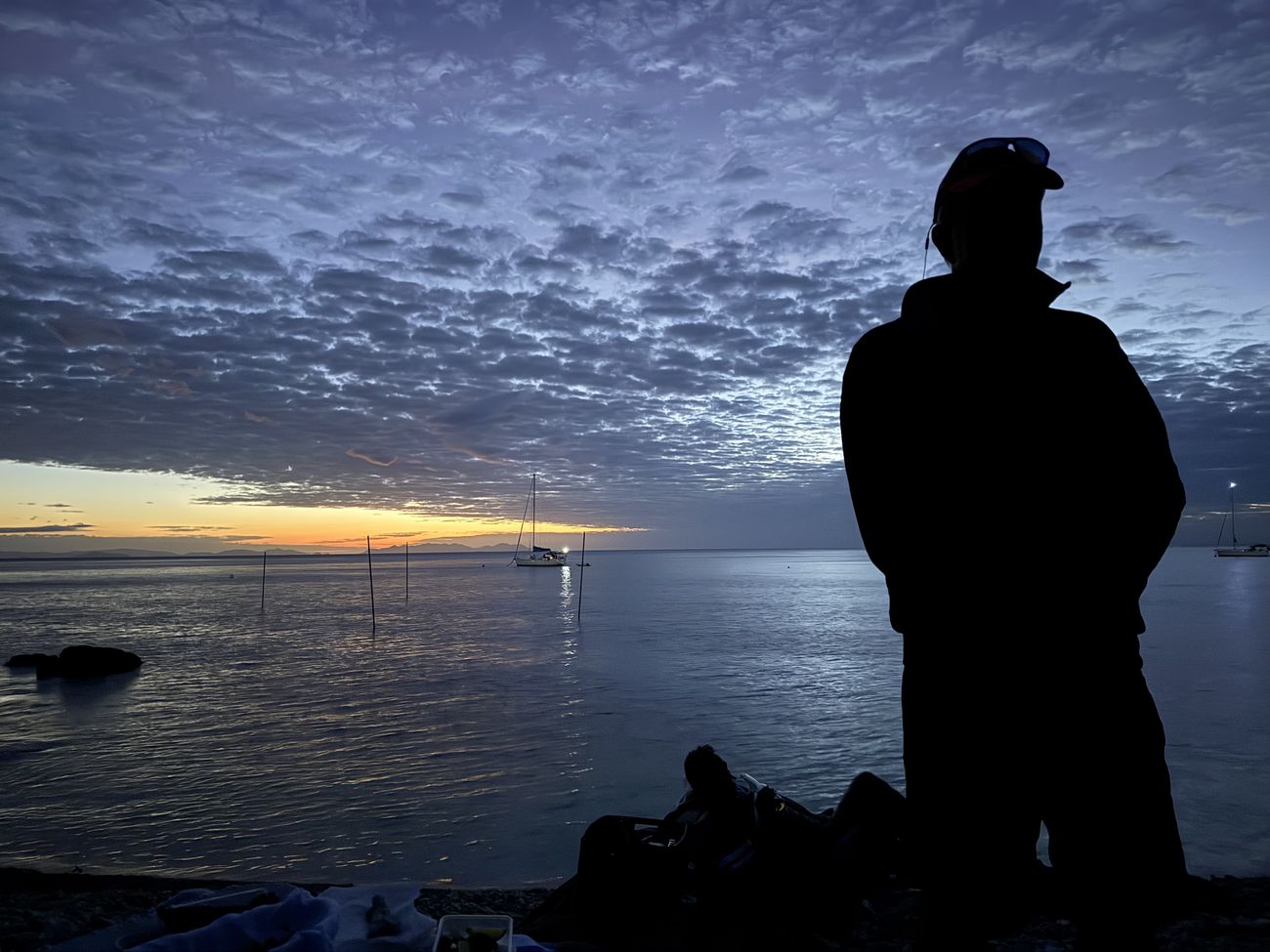 A silhouette at last light, watching over the anchorage at Castle Rock