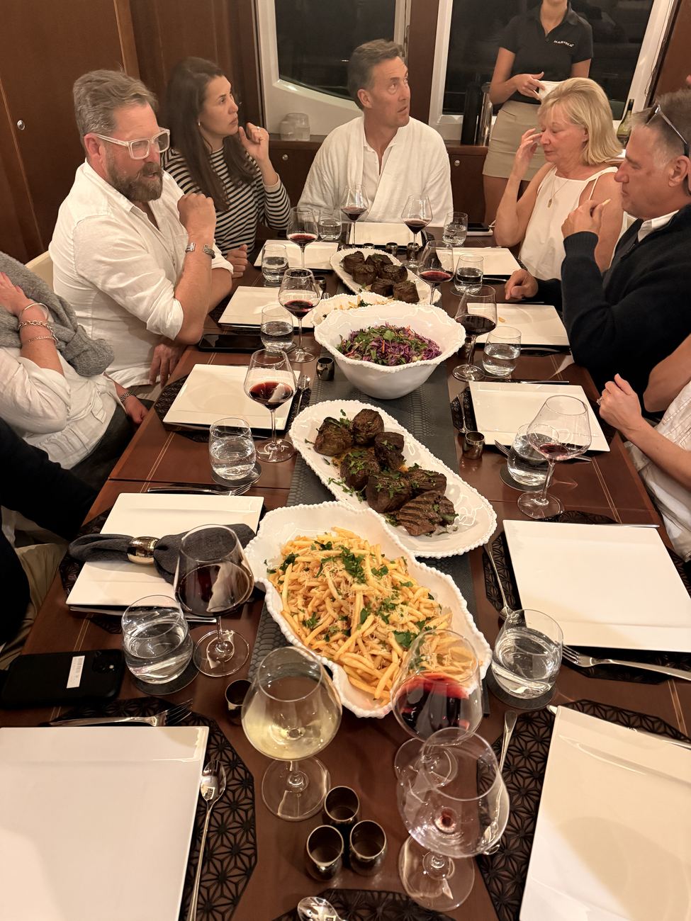 The full dinner table dressed entirely in white