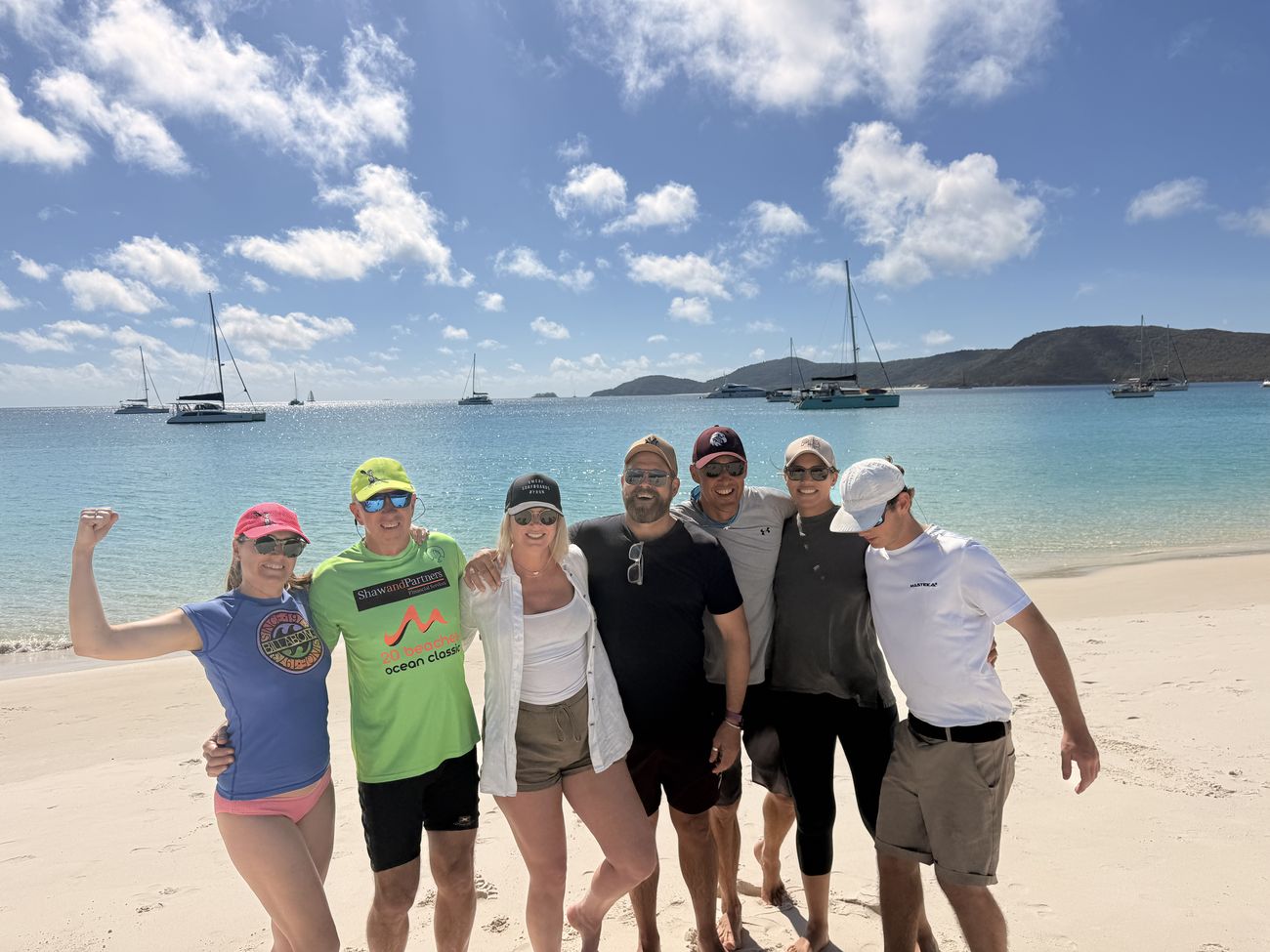 Team two flexing on the beach