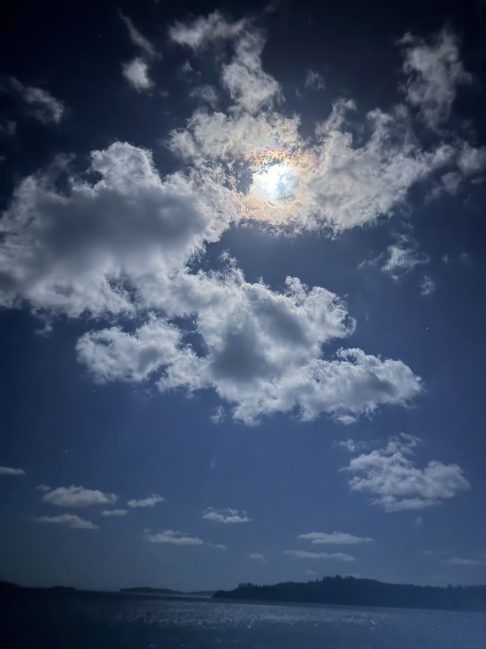 Full moon through clouds