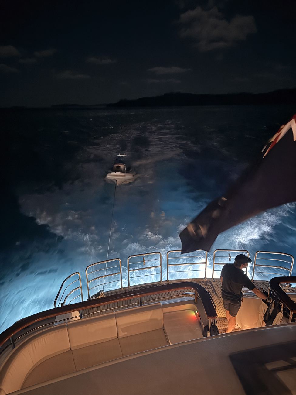 The wake lit at night